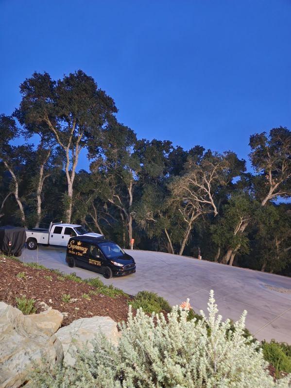 Detailed pickup truck parked under oak trees on the Central Coast