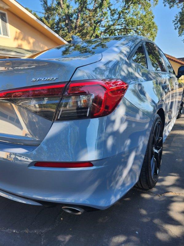 Silver Honda Civic rear quarter after a polish and sealant