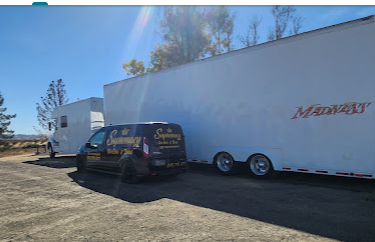 Large enclosed race trailer washed by the Supremacy mobile crew
