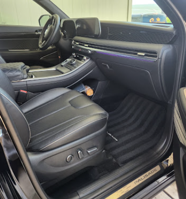 Conditioned black leather seats after a deep interior detail